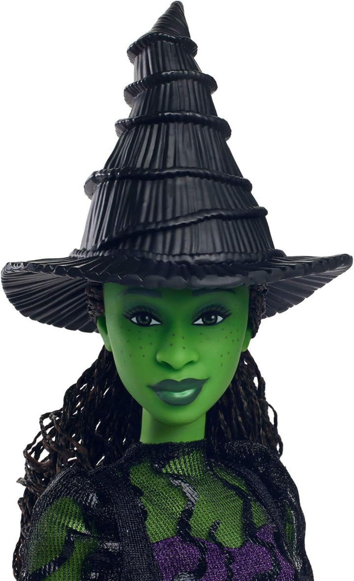 Mattel Wicked Elphaba păpușă de modă și accesorii cu piele verde, păr negru împletit, diferite poziții posibile și aspect de rochie de bal extensibilă, HXT62, [Multicolor] Papusi Naty Shop