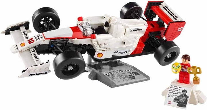 Set de mașini model LEGO Icons Mclaren MP4/4 & Ayrton Senna, kit de mașini de curse F1 pentru adulți cu mini-figură de pilot de curse, obiect de colecție, idee de cadou pentru bărbați, femei, el & ea 10330 Seturi de constructie Besuche den LEGO-Store