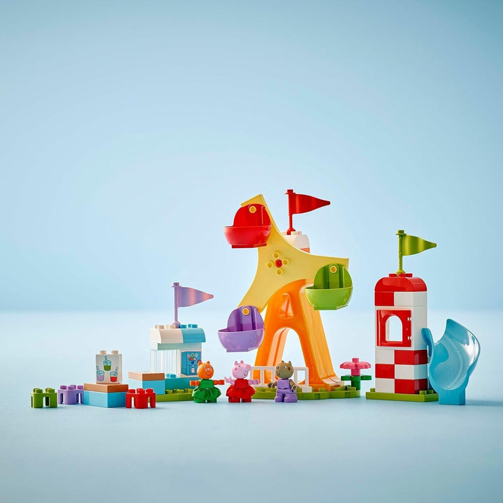 LEGO DUPLO Peppa Wutz Fairground - Jucării pentru copii și jucării pentru abilități motorii pentru vârsta de 2+ - Jocuri preșcolare cu roată mare, tobogan și 3 figuri, inclusiv Mollie Kitty și Klausi Kläff - Cadou pentru copii 10453 Seturi de constructie Besuche den LEGO-Store