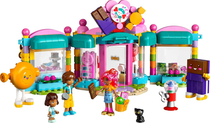 LEGO Friends Heartlake City Shop, set de joacă pentru fete cu vârsta peste 6 ani, joc de rol cu 2 mini-doll-uri, jucărie cu micro-doll și pisică 42649 Seturi de constructie Besuche den LEGO-Store