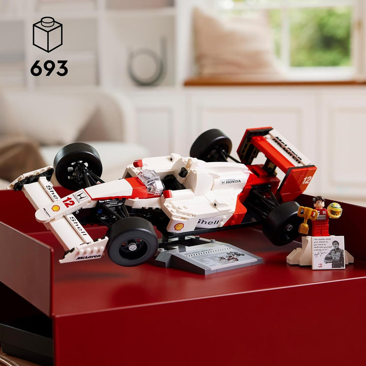 Set de mașini model LEGO Icons Mclaren MP4/4 & Ayrton Senna, kit de mașini de curse F1 pentru adulți cu mini-figură de pilot de curse, obiect de colecție, idee de cadou pentru bărbați, femei, el & ea 10330 Seturi de constructie Besuche den LEGO-Store