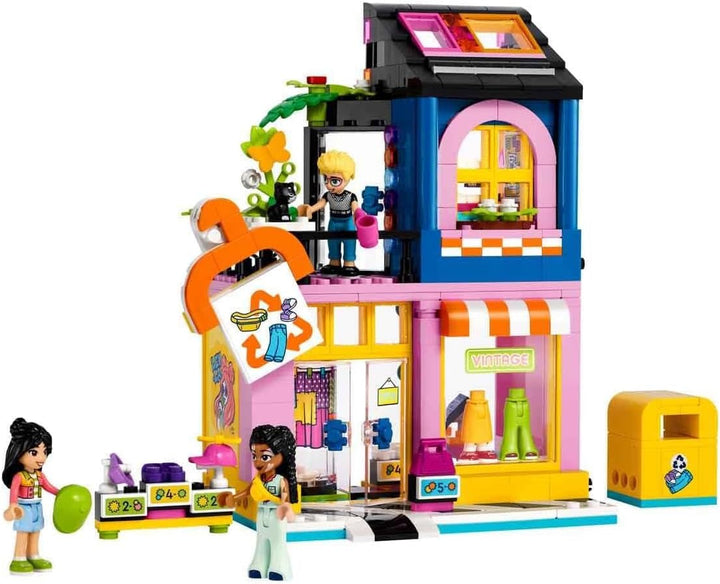 Magazin de modă LEGO Friends Vintage, set de construcție pentru copii cu magazin de jucării, figurine și pisică, model pentru jocul de rol pentru dezvoltarea socio-emoțională, cadou pentru fete și băieți de 6 ani 42614 Seturi de constructie Besuche den LEGO-Store