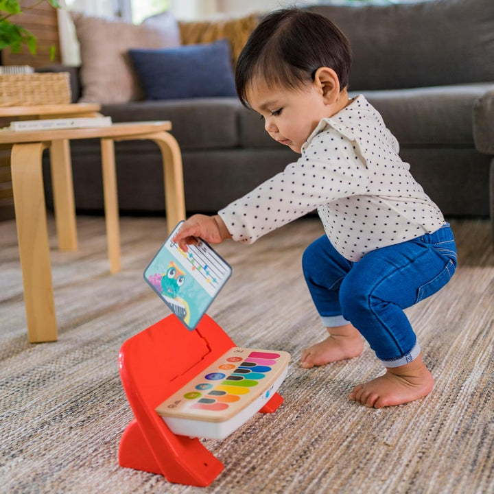 Baby Einstein 12577 Hape Cal's First Melodies Magic Touch Piano Pian muzical de jucărie din lemn cu 3 foi muzicale, 6 melodii, de la 6 luni, multicolor, 1 bucată (pachet de 1) Jucarii Bebe Naty Shop